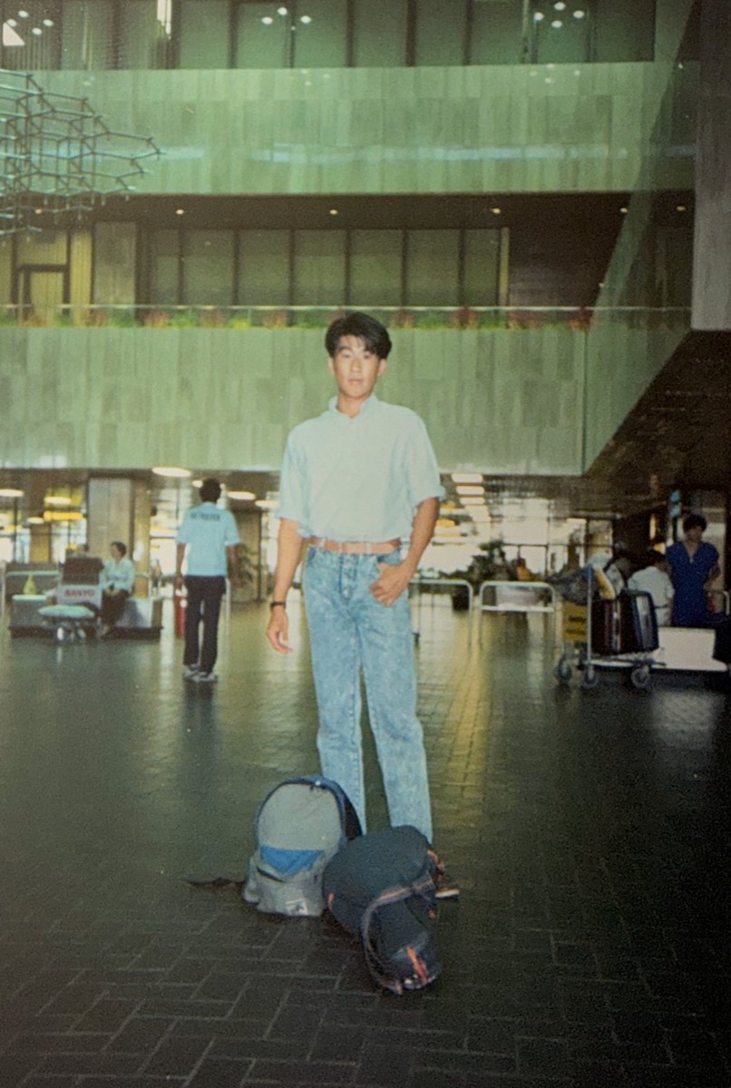 Wilson at Changi Airport with one backpack