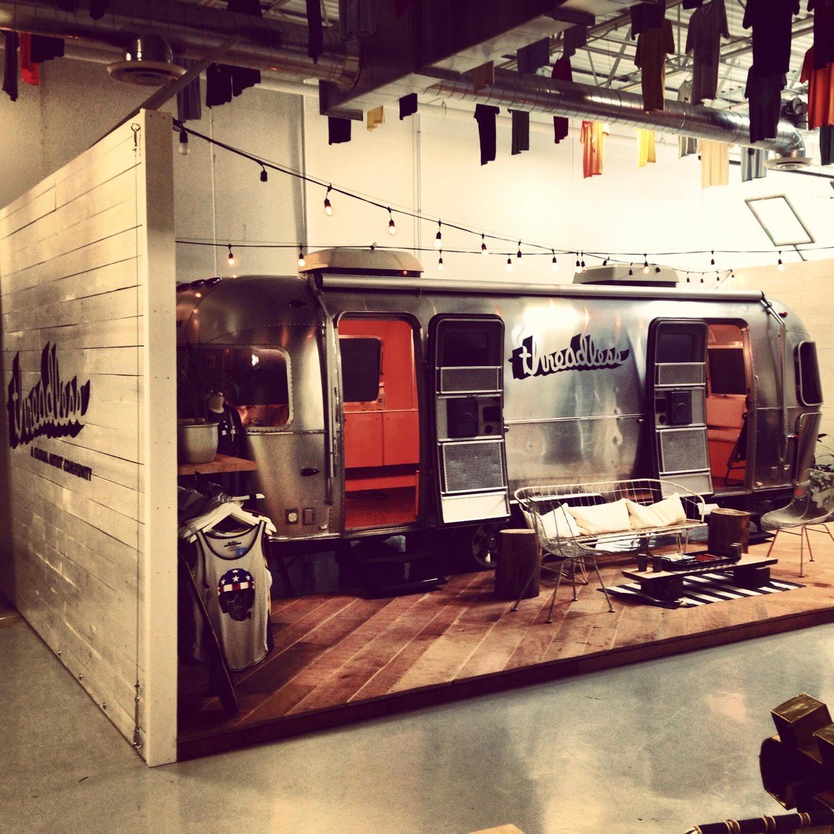The Threadless Airstream booth, Threadless wordmark on the trailer and wall